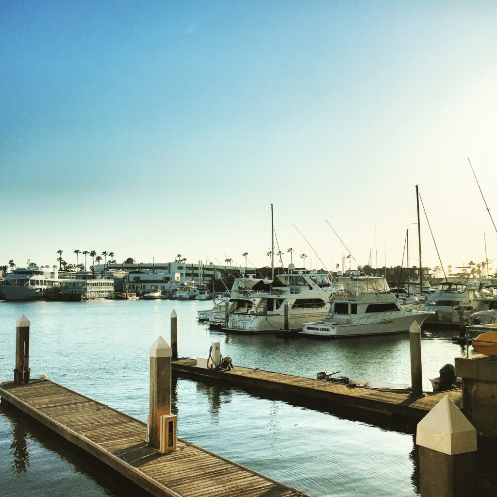 Boats docked on the Balboa Peninsula waterfront.